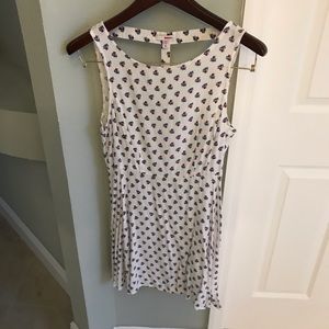 White dress with red and blue flower pattern